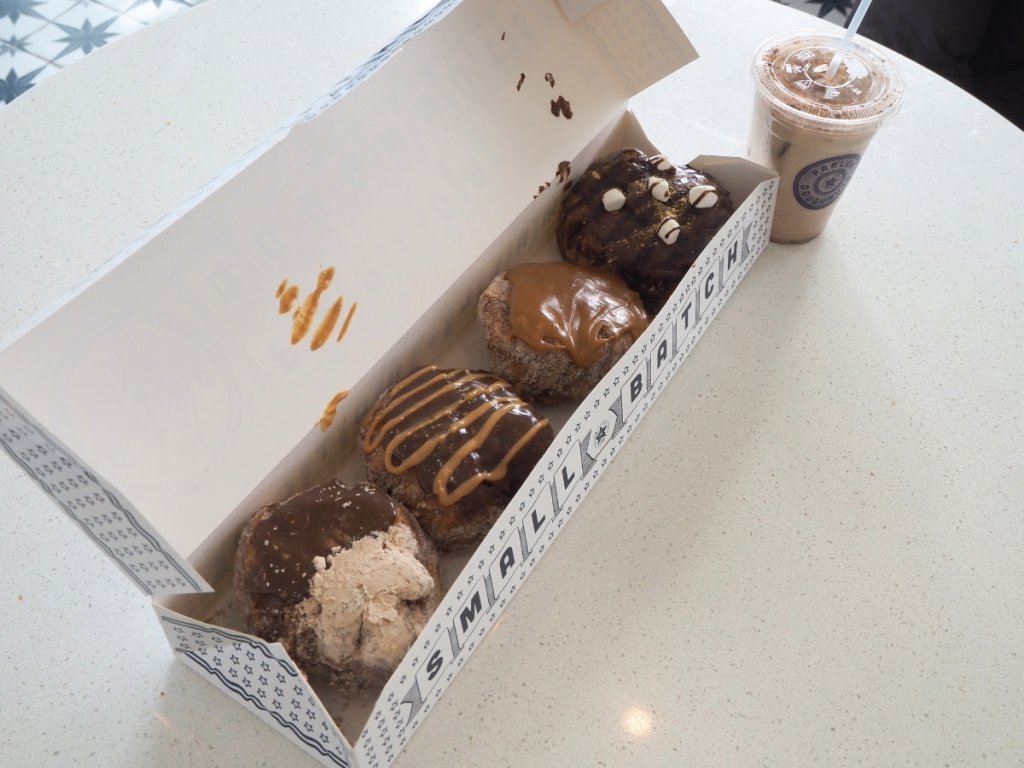 box of donuts and iced coffee in Parlor Doughnuts