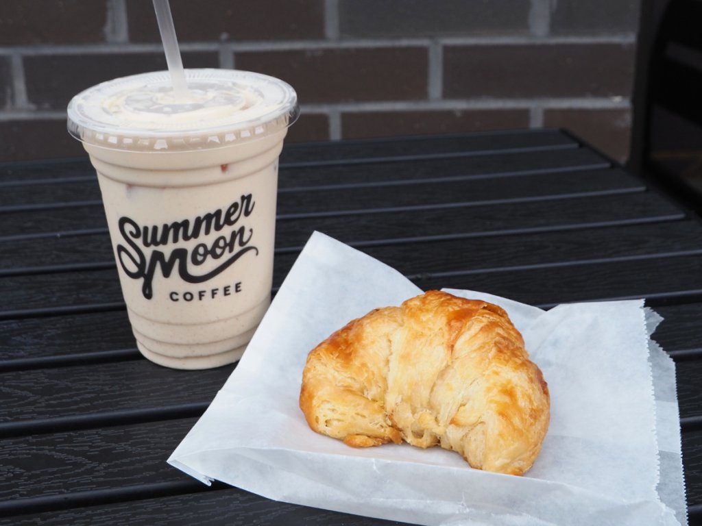 iced coffee and croissant from Summer Moon Coffee