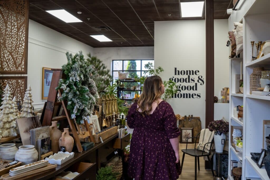 Woman shopping at Park + Alley christmas themed home decor shop farragut knoxville holiday
