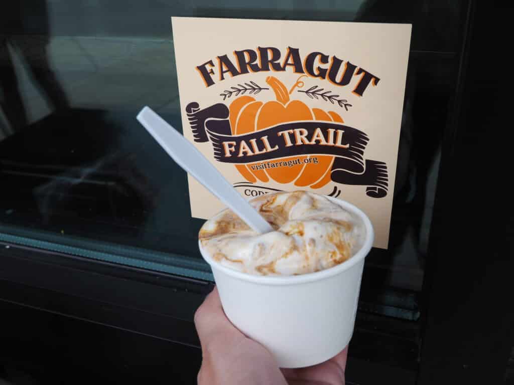 treat at a business promoting the farragut fall trail, a passport check in game to win prizes and learn about businesses in farragut