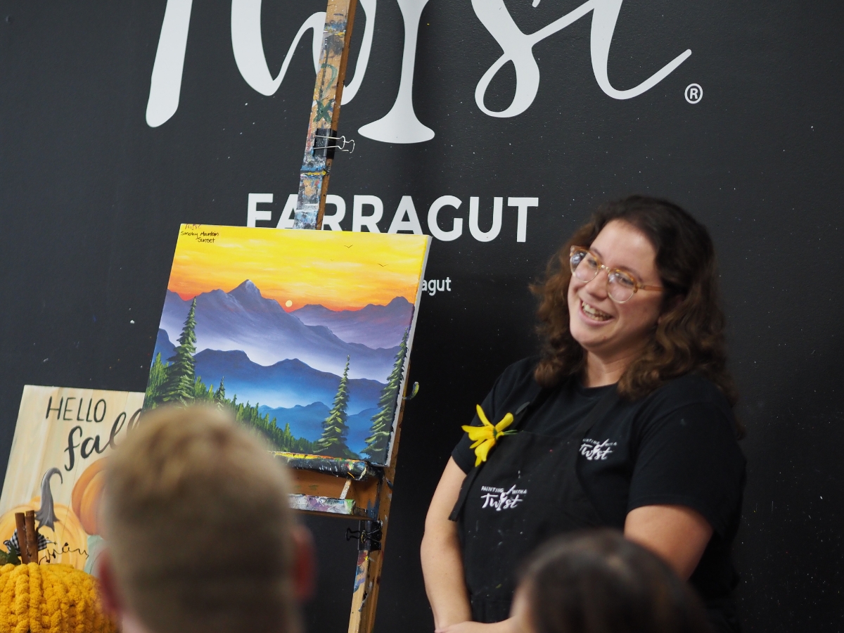 Instructor and painting at Painting With a Twist