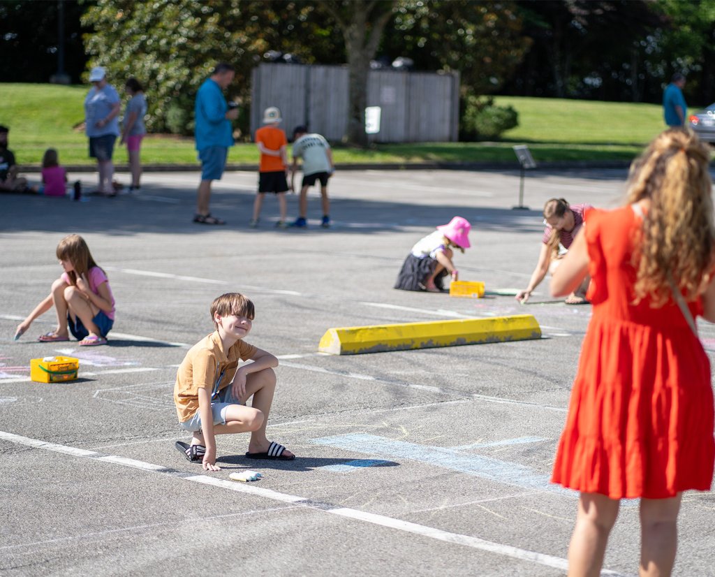 kids drawing with chalk at a Farragut Parks and Recreation event