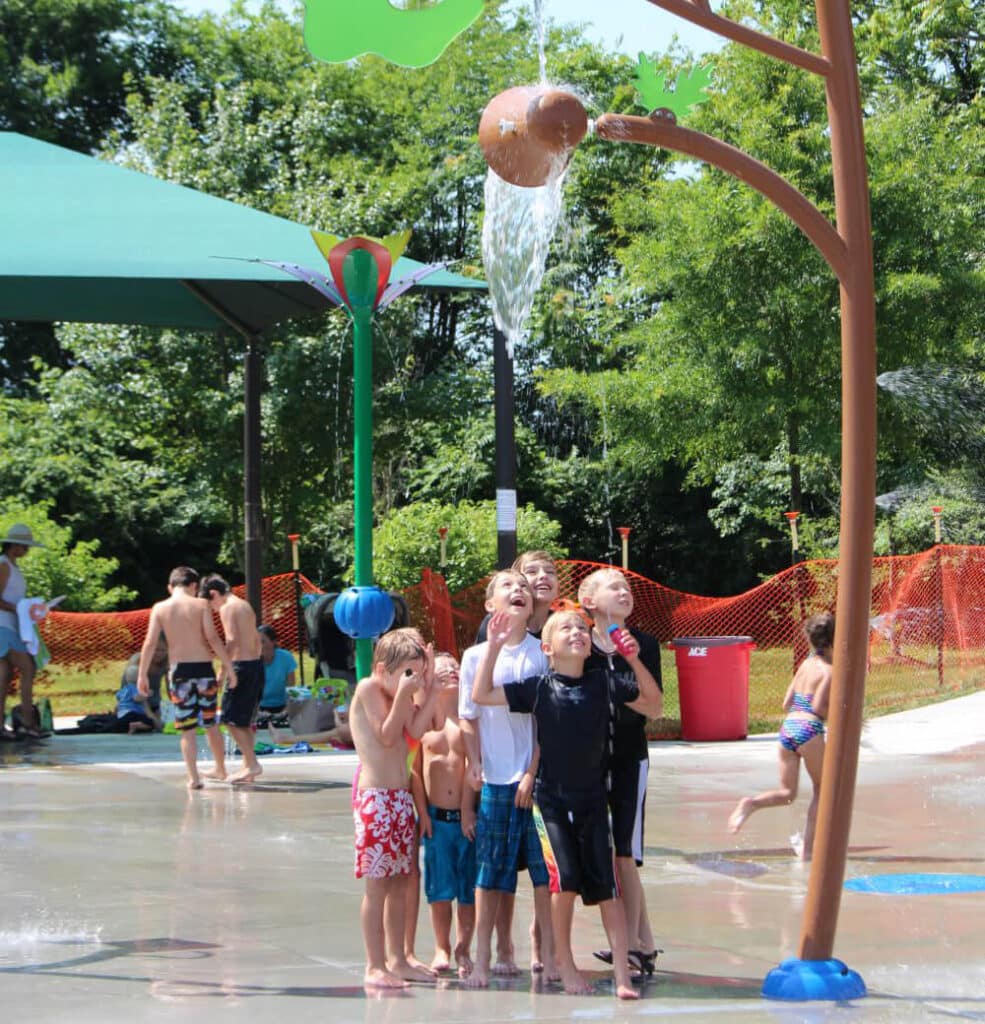 Kids getting splashed at McFee Splash pad in Farragut