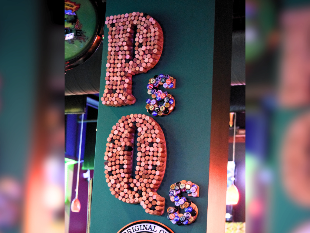 Wall hanging made of corks at Mind Yer P's & Q's