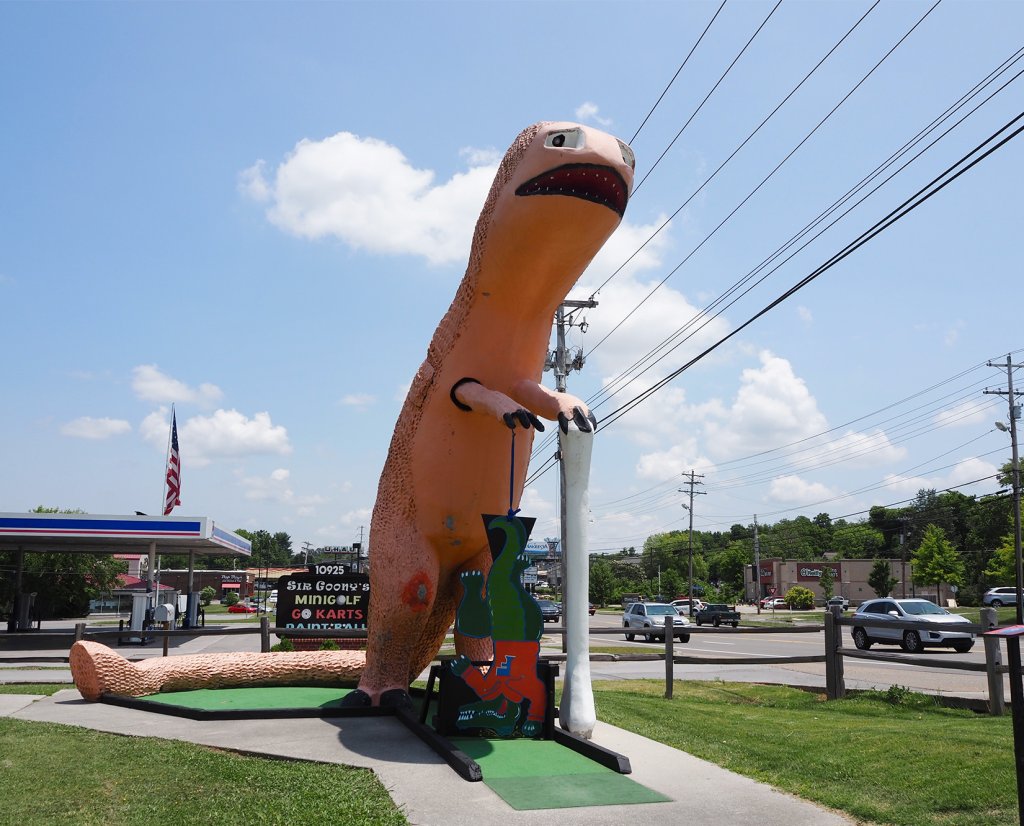 the orange dinosaur sculpture at Sir Goony's