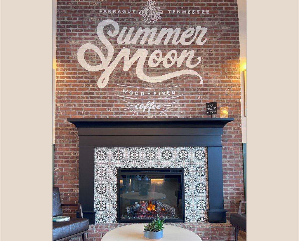 the fireplace and seating area at Summer Moon Coffee